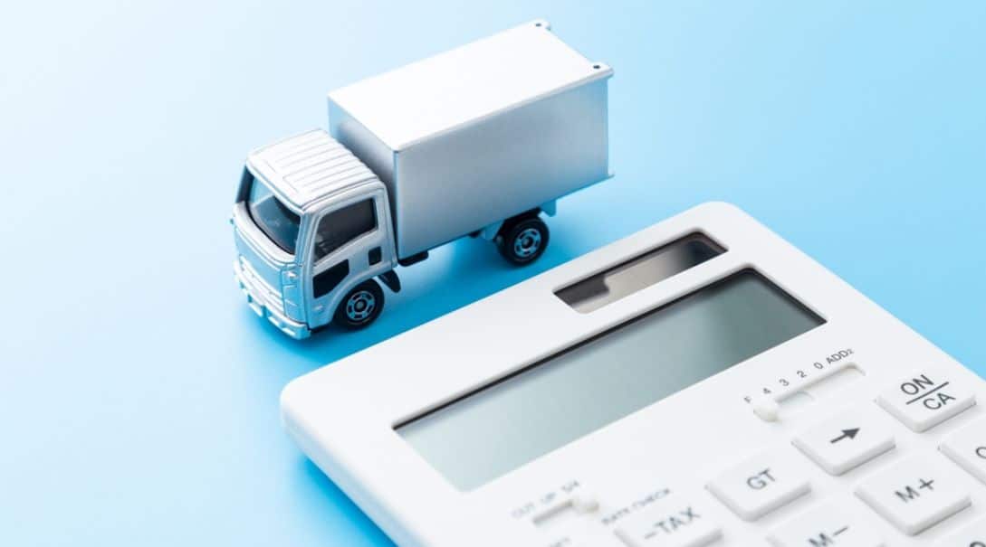 shipping truck next to a calculator