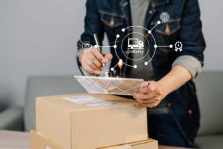 Person Signing Package With Delivery Icons Overlay.