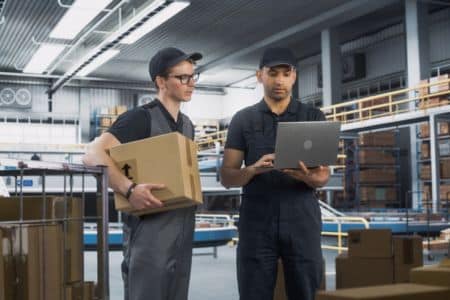 warehouse team discussing logistics and fulfillment processes